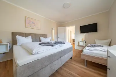 Ein Bett oder Betten in einem Zimmer der Unterkunft Haus Lindolino
