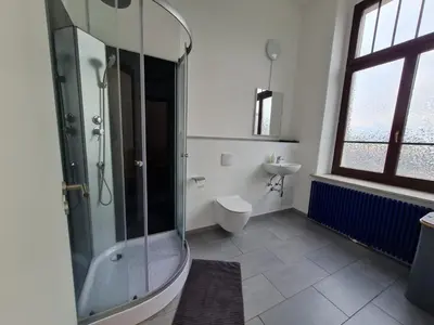 Ein Badezimmer in der Unterkunft Ausblick Freital 4