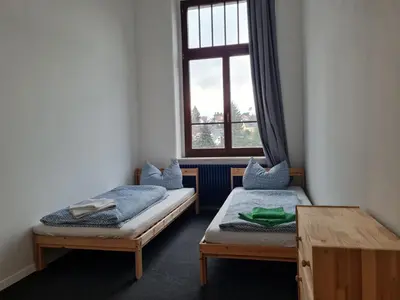 Ein Bett oder Betten in einem Zimmer der Unterkunft Ausblick Freital 4