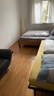 Ein Bett oder Betten in einem Zimmer der Unterkunft Gut gelegene Ferienwohnung in Dresden Neustadt