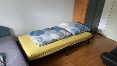 Ein Bett oder Betten in einem Zimmer der Unterkunft Gut gelegene Ferienwohnung in Dresden Neustadt