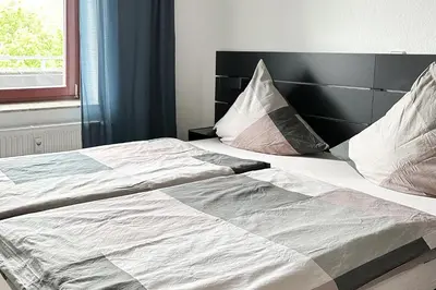 Ein Bett oder Betten in einem Zimmer der Unterkunft Jäckel, App 123