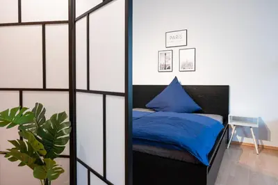 Ein Bett oder Betten in einem Zimmer der Unterkunft Hübschmann, App 126