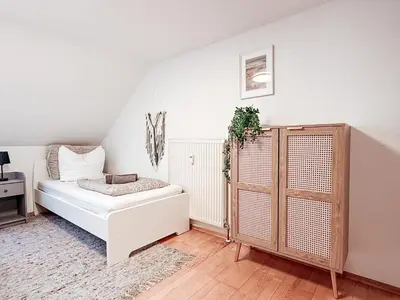 Ein Bett oder Betten in einem Zimmer der Unterkunft Dohna, App 116