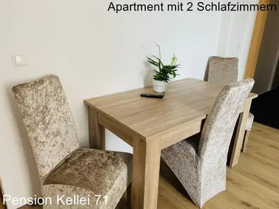 Ein Sitzbereich in der Unterkunft Pension Kellei 71