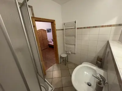 Ein Badezimmer in der Unterkunft Ferienwohnung Pfaffenstein in der alten Försterei