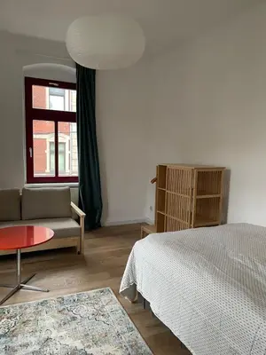 Ein Bett oder Betten in einem Zimmer der Unterkunft Wunderschönes Ferienappartment in Toplage
