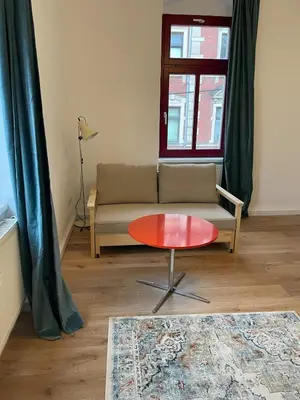 Ein Sitzbereich in der Unterkunft Wunderschönes Ferienappartment in Toplage