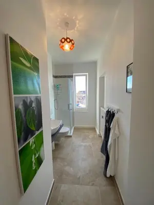 Ein Badezimmer in der Unterkunft Stadtgarten