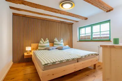 Ein Bett oder Betten in einem Zimmer der Unterkunft Landhof Badeda
