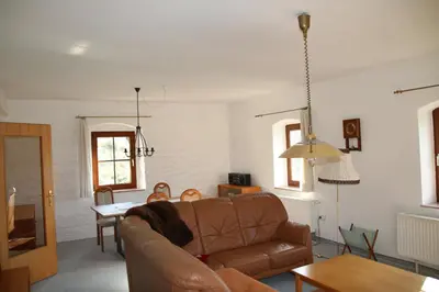 Ein Sitzbereich in der Unterkunft Ferienwohnung am Stadtrand