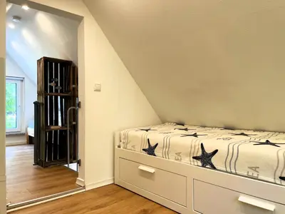 Ein Bett oder Betten in einem Zimmer der Unterkunft Hoffmannshof