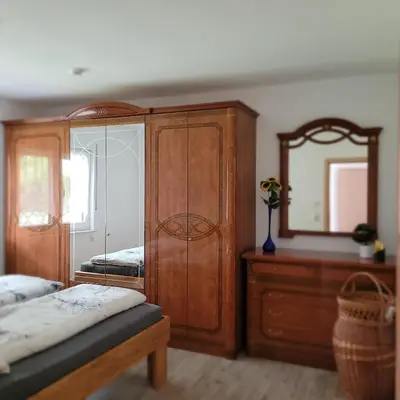 Ein Bett oder Betten in einem Zimmer der Unterkunft Ferienwohnung Weber