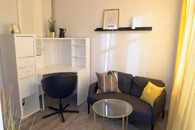 Ein Sitzbereich in der Unterkunft Business Apartment Dresden