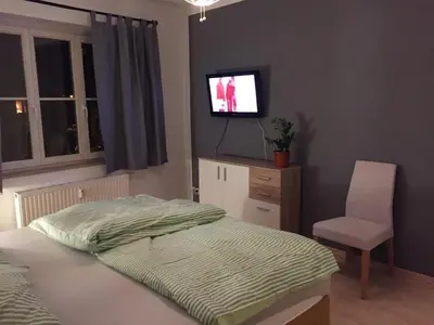 Ein Bett oder Betten in einem Zimmer der Unterkunft Fabelhafte Ferienwohnung in Dresden Neustadt
