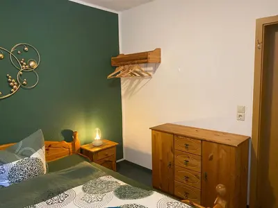 Ein Bett oder Betten in einem Zimmer der Unterkunft Berghaus am Katzenstein urgemütliches Wohnen im Wald