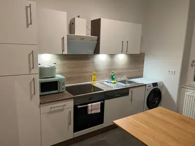 Küche/Küchenzeile in der Unterkunft Moderne Ferienwohnung im Stadtzentrum - ClaraNest