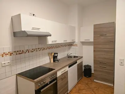 Küche/Küchenzeile in der Unterkunft Boardinghouse mit 10 großen Apartments mit Parkplatz und Balkon