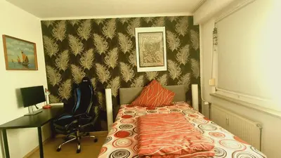 Ein Bett oder Betten in einem Zimmer der Unterkunft 3 Raum Ferienwohnung am Dresden Hauptbahnhof
