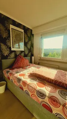 Ein Bett oder Betten in einem Zimmer der Unterkunft 3 Raum Ferienwohnung am Dresden Hauptbahnhof