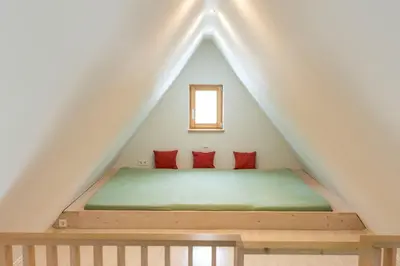 Ein Bett oder Betten in einem Zimmer der Unterkunft Ferienhaus Waitzdorfer Zinne