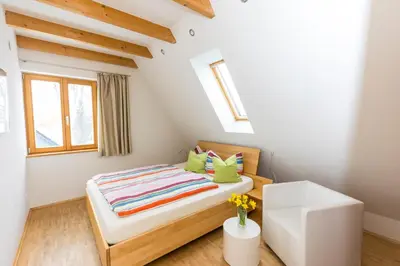 Ein Bett oder Betten in einem Zimmer der Unterkunft Ferienhaus Waitzdorfer Zinne