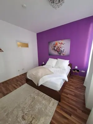 Ein Bett oder Betten in einem Zimmer der Unterkunft Köbi 91