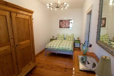 Ein Bett oder Betten in einem Zimmer der Unterkunft Neustadtperle