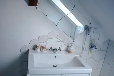 Ein Badezimmer in der Unterkunft Märchenpension Rotkäppchen und der Wolf