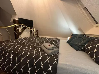 Ein Bett oder Betten in einem Zimmer der Unterkunft Wohnung Iris