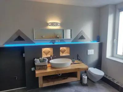 Ein Badezimmer in der Unterkunft Apartment am Hofladen Hellendorf - Sächsische Schweiz by Interhome