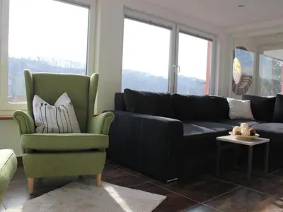 Ein Sitzbereich in der Unterkunft Holiday Home Bungalow Schönblick am Elberadweg in Pirna by Interhome