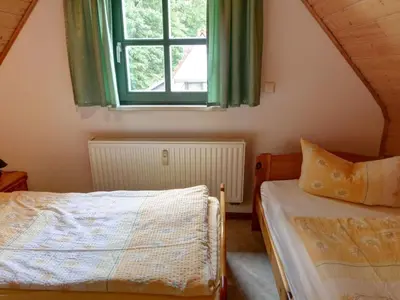 Ein Bett oder Betten in einem Zimmer der Unterkunft Apartment Fewo Hohe Liebe by Interhome