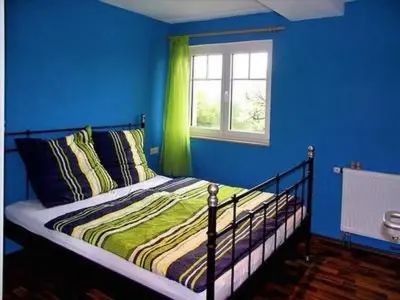 Ein Bett oder Betten in einem Zimmer der Unterkunft Holiday Home zur alten Gärtnerei by Interhome