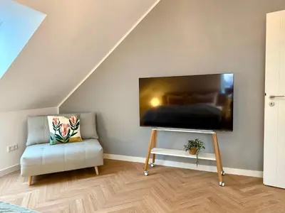 TV/Unterhaltungsangebot in der Unterkunft Neu!! Ruhige helle Penthouse Wohnung - Parking incl