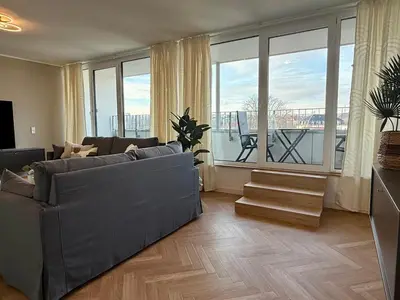 Ein Sitzbereich in der Unterkunft Neu!! Ruhige helle Penthouse Wohnung - Parking incl