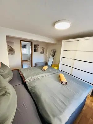 Ein Bett oder Betten in einem Zimmer der Unterkunft Ferienhäuser Radebeul 