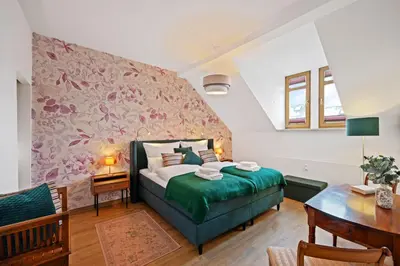 Ein Bett oder Betten in einem Zimmer der Unterkunft Nussknacker Suite - Ankommen & Wohlfühlen - viel Raum für 8 Gäste 3 Schlafzimmer Dachterrasse Freunde Familien 2 WC 120qm