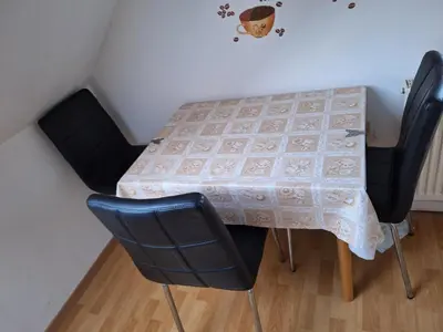 Ein Sitzbereich in der Unterkunft Ferienwohnung Witzschdorfer Höhe