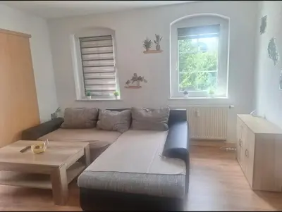 Ein Sitzbereich in der Unterkunft Ferienwohnung Witzschdorfer Höhe