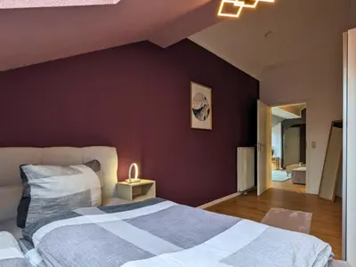 Ein Bett oder Betten in einem Zimmer der Unterkunft Ankommen und Wohlfühlen - Fewo für 4 in Freital