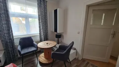 Ein Sitzbereich in der Unterkunft Highland-Apartment by MacLeod