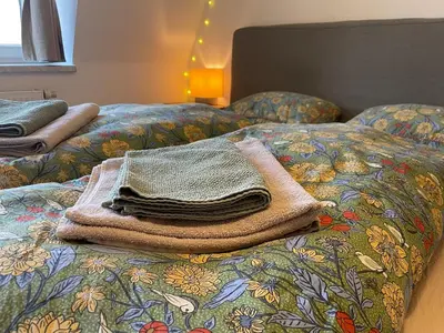 Ein Bett oder Betten in einem Zimmer der Unterkunft Kunstversteck