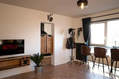 TV/Unterhaltungsangebot in der Unterkunft Wild Western Apartment - Sauna, Balkon, Netflix, Nespresso, Messe