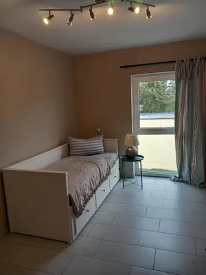 Ein Bett oder Betten in einem Zimmer der Unterkunft Ferienwohnungen Seeglück