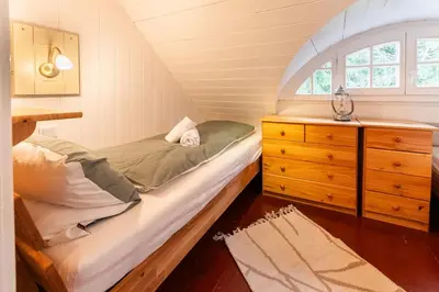 Ein Bett oder Betten in einem Zimmer der Unterkunft Villa Alice - Ferienhaus in der Naturidylle