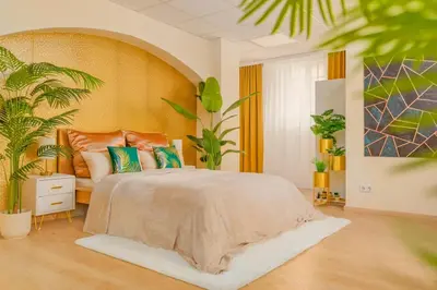 Ein Bett oder Betten in einem Zimmer der Unterkunft Bis 10 Personen - 106 qm Design-Apartment, Top Lage, mit Parkplatz