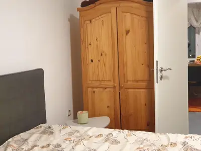 Ein Bett oder Betten in einem Zimmer der Unterkunft sharing room in apartment