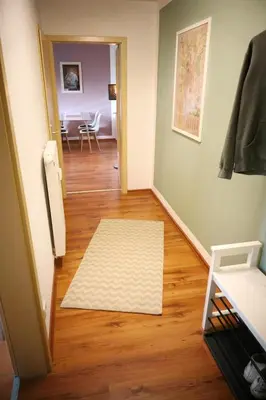Ein Bett oder Betten in einem Zimmer der Unterkunft Apartment Kirschblüte mit Balkon