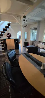 Ein Sitzbereich in der Unterkunft gemütliches Ferienhaus mit privatem Außenpool